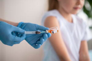 little-girl-vaccinating-coronavirus-hospital